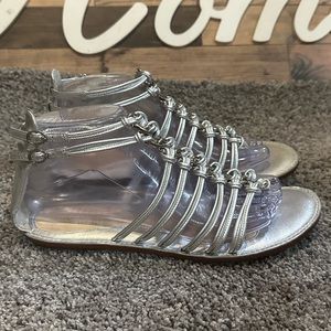 Coach Women’s Sliver Leather Gladiator Sandal Size 7.5. Preowned Good Condition.
